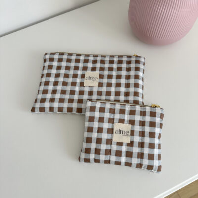 Pochette tra nuvole e quadri